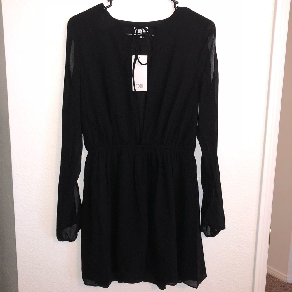 Black dress, low cut front